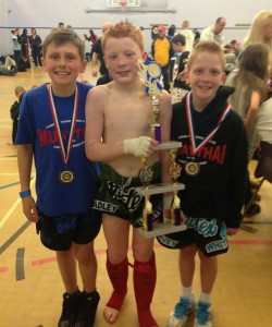 Harvey, Brad and Jack show their medals