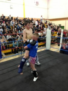 Jack West is lifted by his opponent