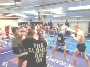 Pads during Saturday's Muay Thai class