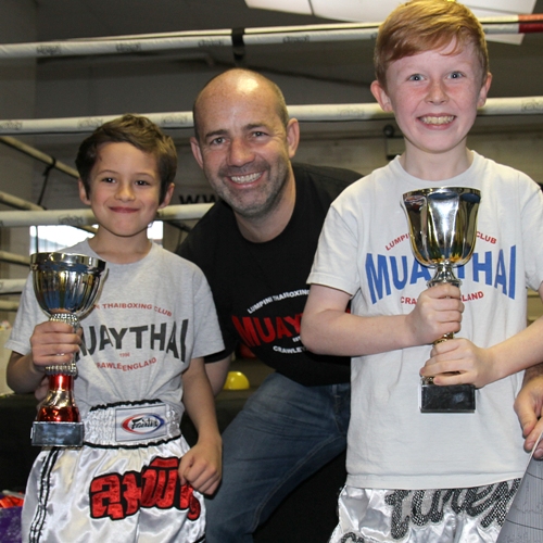 Ace and Drai winning trophies for most improved and best attitude to training